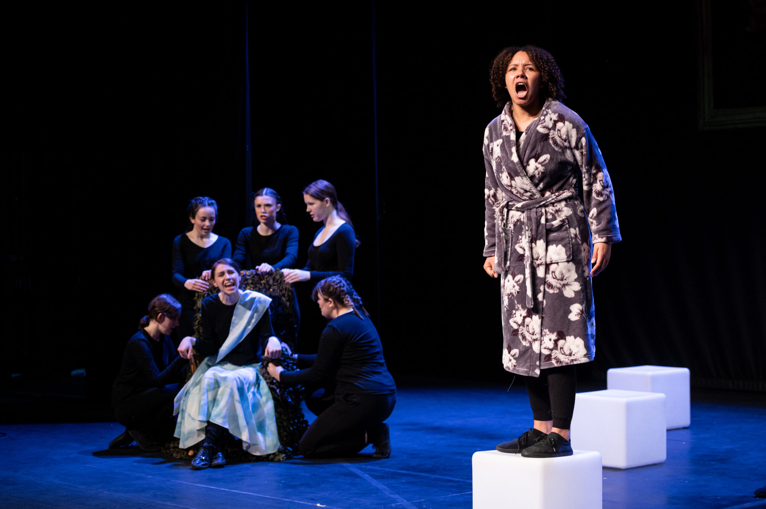 Young actors performing on stage